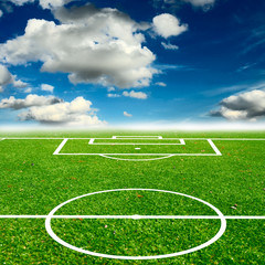 Obraz premium green field with blue sky