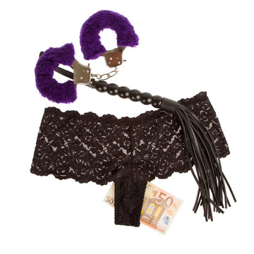 Fluffy purple handcuffs, a whip, money and panties, prostitution