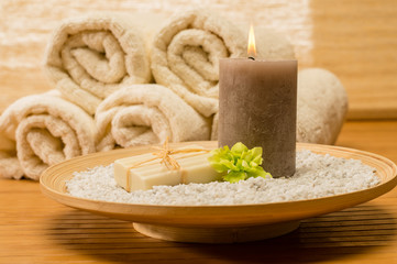 Fototapeta na wymiar Spa decor wooden tray with candle soap