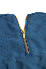 golden zipper on a blue garment