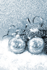 silver christmas balls with christmas tree