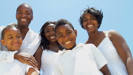 Sons and daughter laughing with parents on video postcard