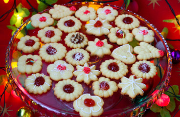 Spritz cookies filled with jam and decoration for  Christmas