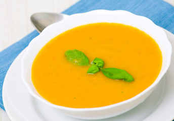 vegetable cream soup in white bowl