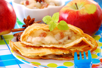 pancake with apple and raisins for child