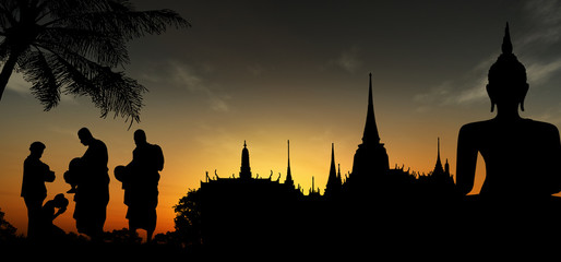 Silhouettes of monks, Thailand