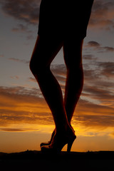 legs heels sunset