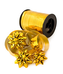 roll of golden ribbons and bows