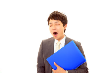 疲れた表情のサラリーマン