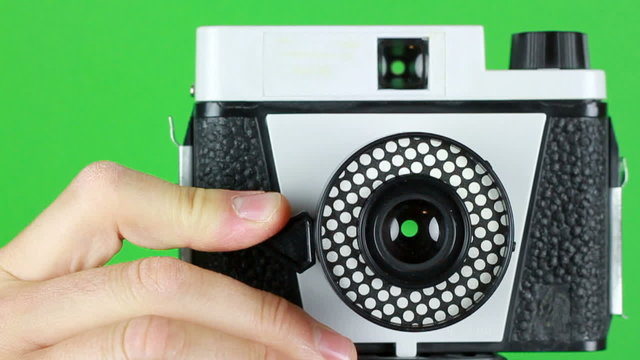 men hand releasing shutter 2 loop clips