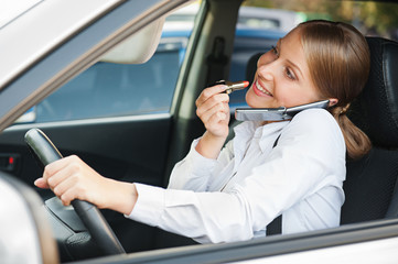 frivolous woman driving the car
