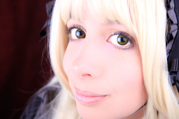 young blonde woman wearing color contact lenses