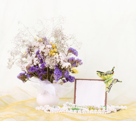 Beautiful spring flowers in a glass vase with banner add