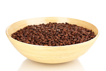 Coffee beans in bamboo bowl isolated on white