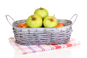 Ripe apples in basket isolated on white