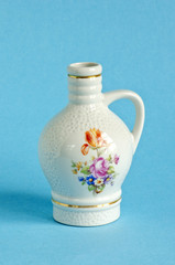 white decorative vase on azure background