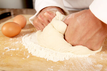 Baker kneading dough