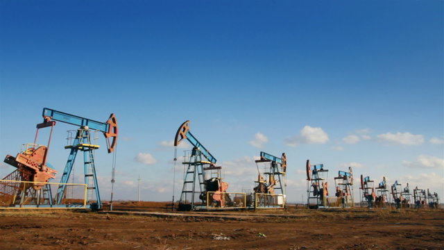 row of many working oil pumps