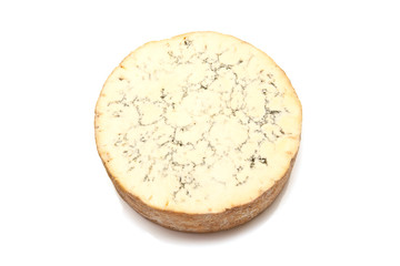 Stilton cheese isolated on a white background.