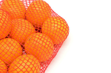 Mesh oranges from the supermarket with copyspace