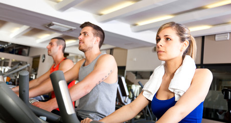 Fototapeta na wymiar Group of people training in a gym