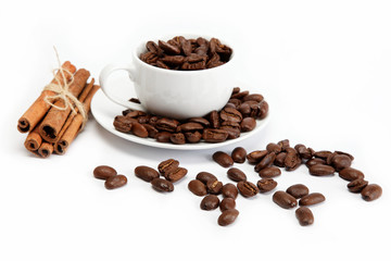 cup with coffee beans isolated on white background.