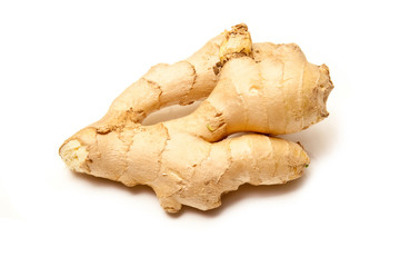 Root ginger isolated on a white studio background.