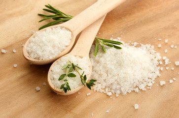salt in spoons with fresh  rosemary and thyme