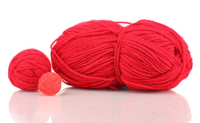 Red knittings yarns isolated on white