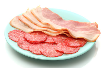 tasty bacon and sausage on plate, isolated on white