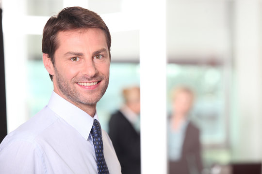 Man smiling in the office