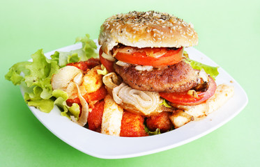 Burger with meat and baked vegetables