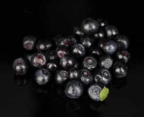 Tasty blueberries isolated on black close-up