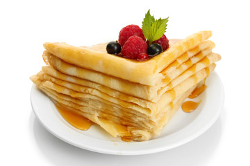 Delicious pancakes with berries and honey