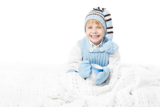 Happy Child In Warm Winter Clothes Holding Mug