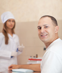 Obraz premium Procedure of blood capture from vein