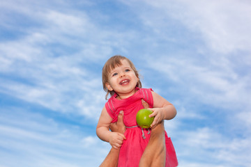 little baby girl over blue skies