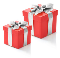 Two red gift boxes with silver ribbon on white background.