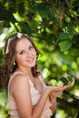 Beauty young woman with an apple