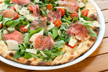 Italian prosciutto and rucola pizza.