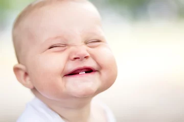 Fotobehang Beautiful smiling cute baby © Maksim Bukovski