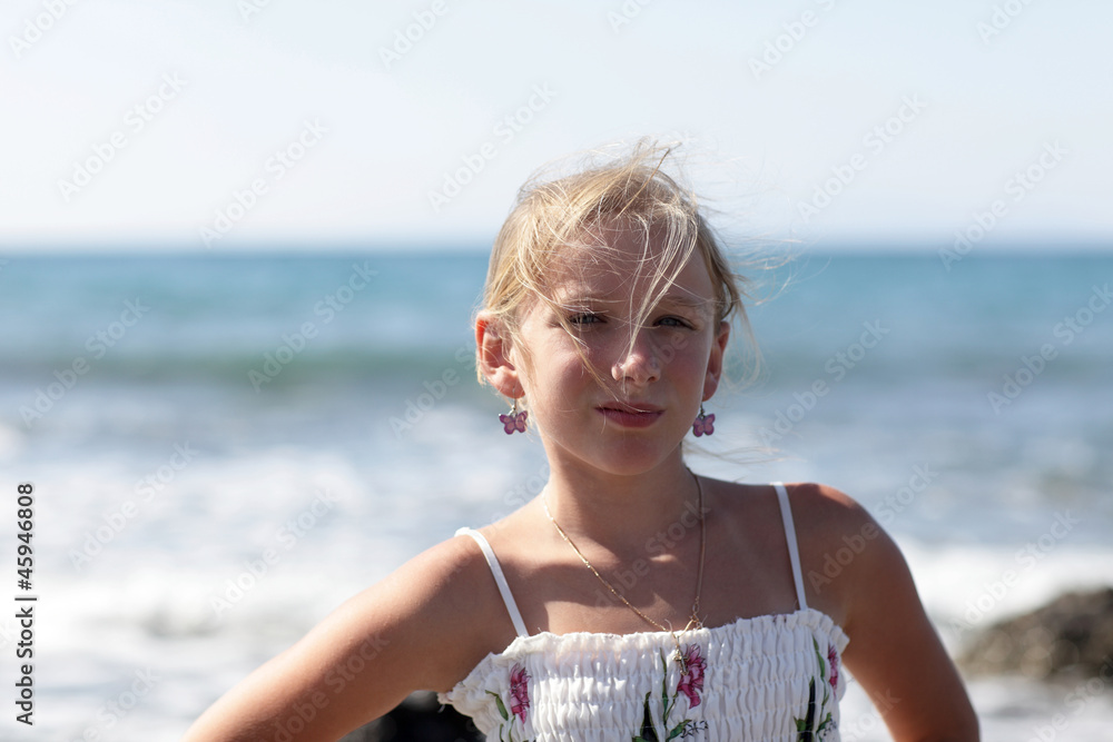 Wall mural Girl on beach