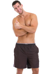 Fototapeta premium Happy male athlete showing thumbs up