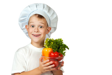 cook boy Chef is holding fresh vegetables. isolated