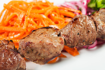 barbecue with sauce and vegetables