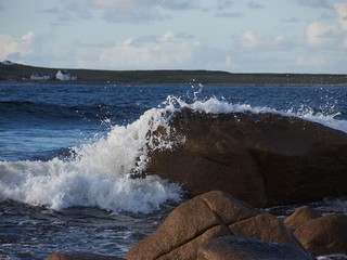 wave over a rock