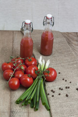 Fresh tomato juice with condiment & chive