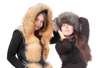 Two attractive women dressed for winter