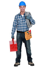 Portrait of a tradesman with his tools