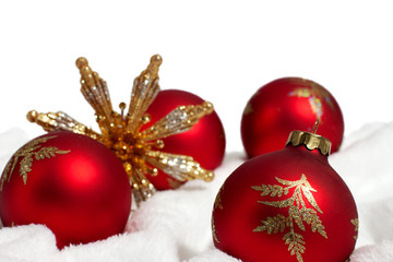 Red and Gold Christmas Decorations on white